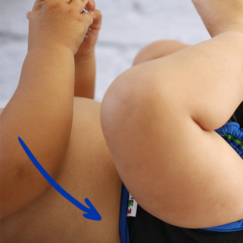Arrow pointing to Best Bottom Diapers comfortable waistband